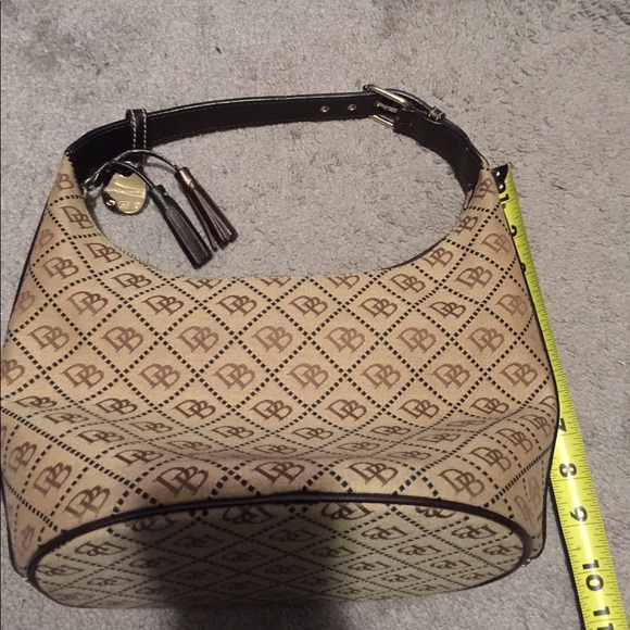 Large Brown dooney & Bourke bucket bag & wristlet - Picture 2 of 8